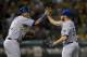 Closer Greg Holland (right) brings together one of the best bullpens in baseball.