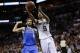 May 4, 2014; San Antonio, TX, USA; San Antonio Spurs guard Tony Parker (9) drives to the basket past Dallas Mavericks guard Jose Calderon (left) in game seven of the first round of the 2014 NBA Playoffs at AT&T Center. Mandatory Credit: Soobum Im-USA TOD