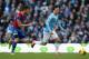 MANCHESTER, ENGLAND - DECEMBER 28: Joel Ward of Crystal Palace challenges David Silva of Manchester City during the Barclays Premier League match between Manchester City and Crystal Palace at the Etihad Stadium on December 28, 2013 in Manchester, England