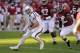 November 10, 2012; Tuscaloosa, AL, USA; Texas A&M Aggies quarterback Johnny Manziel (2) carries through the Alabama Crimson Tide defense during the first quarter at Bryant Denny Stadium. Mandatory Credit: John David Mercer-USA TODAY Sports