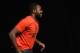 December 13, 2013; Sacramento, CA, USA; UFC light heavyweight Jon Jones walks on stage for the announcement of the EA Sports UFC video game cover winner before the official weigh-in for UFC on FOX 9 at Sleep Train Arena. Mandatory Credit: Kyle Terada-USA