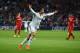 CARDIFF, WALES - AUGUST 12: Real Madrid player Ronaldo (r) celebrates after scoring the second goal during the UEFA Super Cup match between Real Madrid and Sevilla FC at Cardiff City Stadium on August 12, 2014 in Cardiff, Wales. (Photo by Stu Forster/G