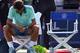 TORONTO, ON - AUGUST 10: Roger Federer of Switzerland sits in his chair after his loss to Jo-Wilfried Tsonga of France in the finals match during Rogers Cup at Rexall Centre at York University on August 10, 2014 in Toronto, Canada. (Photo by Ronald Marti