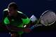 TORONTO, ON - AUGUST 10: Jo-Wilfried Tsonga of France returns a shot to Roger Federer of Switzerland in their finals match during Rogers Cup at Rexall Centre at York University on August 10, 2014 in Toronto, Canada. (Photo by Ronald Martinez/Getty Image
