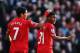 LIVERPOOL, ENGLAND - DECEMBER 21: (L-R) Luis Suarez and Raheem Sterling of Liverpool react during the Barclays Premier League match between Liverpool and Cardiff City at Anfield on December 21, 2013 in Liverpool, England. (Photo by Clive Brunskill/Getty