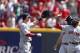 CINCINNATI, OH - AUGUST 13: Jackie Bradley Jr. #25 and Kelly Johnson #7 of the Boston Red Sox celebrate after the game against the Cincinnati Reds at Great American Ball Park on August 13, 2014 in Cincinnati, Ohio. The Red Sox won 5-4. (Photo by Joe Robbi