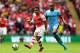 LONDON, ENGLAND - AUGUST 10: Alexis Sanchez of Arsenal in action against Fernando of Manchester City during the FA Community Shield match between Manchester City and Arsenal at Wembley Stadium on August 10, 2014 in London, England. (Photo by Clive Mason/