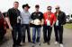 DAYTONA BEACH, FL - FEBRUARY 22: Donald 'Cowboy' Cerrone (2ndL) presents NASCAR driver Kevin Harvick (C) with an UFC belt at Daytona International Speedway on February 22, 2014 in Daytona Beach, Florida. (Photo by Jared C. Tilton/Getty Images)