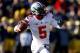 ANN ARBOR, MI - NOVEMBER 30: Quarterback Braxton Miller #5 of the Ohio State Buckeyes looks to pass in the second quarter against the Michigan Wolverines during a game at Michigan Stadium on November 30, 2013 in Ann Arbor, Michigan. (Photo by Gregory Sha