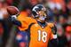 DENVER, CO - JANUARY 12: Quarterback Peyton Manning #18 of the Denver Broncos drops back to pass against the San Diego Chargers during the AFC Divisional Playoff Game at Sports Authority Field at Mile High on January 12, 2014 in Denver, Colorado. Colorad