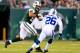 EAST RUTHERFORD, NJ - AUGUST 07: Wide receiver Eric Decker #87 of the New York Jets runs with the ball after making a catch in the first quarter as free safety Delano Howell #26 of the Indianapolis Colts defends during a preseason game at MetLife Stadium