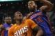 Mar 21, 2014; Phoenix, AZ, USA; Phoenix Suns guard Eric Bledsoe (2) drwas the foul on Detroit Pistons forward Greg Monroe (10) in the third quarter at US Airways Center. Mandatory Credit: Rick Scuteri-USA TODAY Sports
