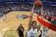 NEW ORLEANS, LA - MARCH 22: Anthony Davis #23 of the New Orleans Pelicans dunks against the Miami Heat on March 22, 2014 at the Smoothie King Center in New Orleans, Louisiana. NOTE TO USER: User expressly acknowledges and agrees that, by downloading and
