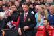 MANCHESTER, ENGLAND - AUGUST 16: Manchester United Manager Louis van Gaal takes his seat prior to the Barclays Premier League match between Manchester United and Swansea City at Old Trafford on August 16, 2014 in Manchester, England. (Photo by Alex Live