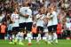 LONDON, ENGLAND - AUGUST 16: Matchwinning goalscorer Eric Dier (R) of Spurs is congratulated by teammate Lewis Holtby following their team's 1-0 victory during the Barclays Premier League match between West Ham United and Tottenham Hotspur at Boleyn Grou