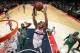 WASHINGTON, DC - JANUARY 22: Kevin Seraphin #13 of the Washington Wizards rebounds against Joel Anthony #50 of the Boston Celtics during the game at the Verizon Center on January 22, 2014 in Washington, DC. NOTE TO USER: User expressly acknowledges and ag