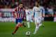 MADRID, SPAIN - FEBRUARY 11: Jese Rodriguez (R) of Real Madrid CF competes for the ball with Juan Francisco Torres alias Juanfran (L) of Atletico de Madrid during the Copa del Rey semi-final second leg match between Club Atletico de Madrid and Real Madrid