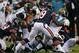 CHICAGO, IL - AUGUST 14: Will Blackmon #24 of the Jacksonville Jaguars recovers a fumbled kickoff return as Josh Morgan #19 of the Chicago Bears makes the tackle during the first quarter of a preseason game at Soldier Field on August 14, 2014 in Chicago,