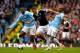 MANCHESTER, ENGLAND - APRIL 05: Jay Rodriguez of Southampton is challenged by Yaya Toure (L) and Fernandinho (R) of Manchester City during the Barclays Premier League match between Manchester City and Southampton at Etihad Stadium on April 5, 2014 in Man