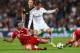 MADRID, SPAIN - APRIL 23: Gareth Bale of Real Madrid takes on Javi Martinez (L) and Philipp Lahm of Bayern Muenchen during the UEFA Champions League semi-final first leg match between Real Madrid and FC Bayern Muenchen at the Estadio Santiago Bernabeu on