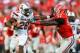 Sep 7, 2013; Athens, GA, USA; South Carolina Gamecocks running back Mike Davis (28) stiff arms Georgia Bulldogs linebacker Amarlo Herrera (52) in the second half at Sanford Stadium. Georgia won 41-30. Mandatory Credit: Daniel Shirey-USA TODAY Sports