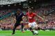 MANCHESTER, ENGLAND - SEPTEMBER 14: Adnan Januzaj of Manchester United takes on Jason Puncheon of Crystal Palace during the Barclays Premier League match between Manchester United and Crystal Palace at Old Trafford on September 14, 2013 in Manchester, En