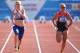 SWANSEA, WALES - AUGUST 20: Erin McBride of Great Britain (R) beats Sophie Janne Engeleiter of Germany to win the womens 100m T13 event during day two of the IPC Athletics European Championships at Swansea University Sports Village on August 20, 2014 in S