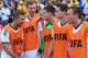 RIO DE JANEIRO, BRAZIL - JULY 04: Lukas Podolski (L) and Per Mertesacker of Germany (2nd L) look on with teammates from the bench during the 2014 FIFA World Cup Brazil Quarter Final match between France and Germany at Maracana on July 4, 2014 in Rio de J