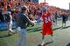 DENVER, CO - AUGUST 16: John Grant Jr. #24 of the Denver Outlaws celebrates with head coach B.J. O'Hara after they defeated the New York Lizards 14-13 during a Major League Lacrosse semifinal game at Peter Barton Stadium on August 16, 2014 in Denver, Colo