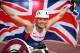 SWANSEA, WALES - AUGUST 21: Samantha Kinghorn of Great Britain celebrates after winning the womens 800M T53 final and her third gold medal during day three of the IPC Athletics European Championships at Swansea University Sports Village on August 21, 2014