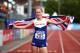 SWANSEA, WALES - AUGUST 21: Maria Lyle of Great Britain celebrates after winning the Womens 200m T35 final during day three of the IPC Athletics European Championships at Swansea University Sports Village on August 21, 2014 in Swansea, Wales. (Photo by Ch