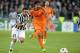 TURIN, ITALY - NOVEMBER 05: Fabio Quagliarella of Juventus and Sami Khedira of Real Madrid (R) compete for the ball during the UEFA Champions League Group B match between Juventus and Real Madrid at Juventus Arena on November 5, 2013 in Turin, Italy. (P