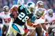 CHARLOTTE, NC - DECEMBER 01: Lavonte David #54 of the Tampa Bay Buccaneers pursues Jonathan Stewart #28 of the Carolina Panthers during play at Bank of America Stadium on December 1, 2013 in Charlotte, North Carolina. (Photo by Grant Halverson/Getty Ima
