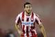 ATHENS,GREECE - JANUARY 12: Kostas Manolas of Olympiacos during the Greek Superleague match between Atromitos Athinon and Olympiacos at the Peristeri Stadium on January 12, 2014 in Athens,Greece. (Photo by Aris Messins/EuroFootball/Getty Images)