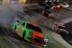 BRISTOL, TN - AUGUST 23: Danica Patrick, driver of the #10 GoDaddy Chevrolet, is involved in an incident during the NASCAR Sprint Cup Series Irwin Tools Night Race at Bristol Motor Speedway on August 23, 2014 in Bristol, Tennessee. (Photo by Patrick Smi