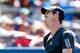 NEW YORK, NY - AUGUST 25: Andy Murray of Great Britain reacts against Robin Haase of the Netherlands during his men's singles first round match on Day One of the 2014 US Open at the USTA Billie Jean King National Tennis Center on August 25, 2014 in the