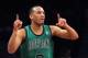 Mar 21, 2014; Brooklyn, NY, USA; Boston Celtics point guard Avery Bradley (0) reacts after hitting a three-point shot against the Brooklyn Nets during the third quarter of a game at Barclays Center. The Nets defeated the Celtics 114-98. Mandatory Credit:
