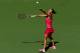 NEW YORK, NY - AUGUST 25: Simona Halep of Romania serves to Danielle Rose Collins of the United States during their women's singles first round match on Day One of the 2014 US Open at the USTA Billie Jean King National Tennis Center on August 25, 2014 i