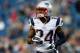 FOXBORO, MA - AUGUST 22: Darrelle Revis #24 of the New England Patriots runs into position during before a game with the Carolina Panthers at Gillette Stadium on August 22, 2014 in Foxboro, Massachusetts. (Photo by Jim Rogash/Getty Images)