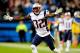 CHARLOTTE, NC - NOVEMBER 18: Devin McCourty #32 of the New England Patriots reacts after being called for defensive holding late in the fourth qurter of a loss to the Carolina Panthers at Bank of America Stadium on November 18, 2013 in Charlotte, North C