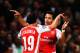 LONDON, ENGLAND - AUGUST 27: Alexis Sanchez (R) of Arsenal celebrates with team mate Santi Cazorla of Arsenal after scoring during the UEFA Champions League Qualifier 2nd leg match between Arsenal and Besiktas at the Emirates Stadium on August 27, 2014 i