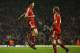 LIVERPOOL, UNITED KINGDOM - DECEMBER 23: Xabi Alonso (L) of Liverpool is congratulated by team mate John Arne Riise after scoring his team's second goal during the Barclays Premiership match between Liverpool and Watford at Anfield on December 23, 2006 i