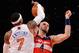 NEW YORK, NY - DECEMBER 16: Carmelo Anthony #7 of the New York Knicks blocks a shot by Marcin Gortat #4 of the Washington Wizards during the first half at Madison Square Garden on December 16, 2013 in New York City. NOTE TO USER: User expressly acknowled