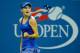 NEW YORK, NY - AUGUST 28: Catherine 'CiCi' Bellis of the United States reacts against Zarina Diyas of Kazakhstan during their women's singles second round match on Day Four of the 2014 US Open at the USTA Billie Jean King National Tennis Center on August