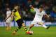 MADRID, SPAIN - APRIL 02: Xabi Alonso of Real Madrid challenges Nuri Sahin of Borussia Dortmund during the UEFA Champions League Quarter Final first leg match between Real Madrid and Borussia Dortmund at Estadio Santiago Bernabeu on April 2, 2014 in M