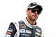 INDIANAPOLIS, IN - JULY 26: Jimmie Johnson, driver of the #48 Lowe's / Kobalt Tools Chevrolet, looks on from the grid during qualifying for the NASCAR Sprint Cup Series Crown Royal Presents The John Wayne Walding 400 at the Brickyard Indianapolis Motor S