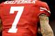 NEW ORLEANS, LA - FEBRUARY 03: A detailed view of the tattoo's of Colin Kaepernick #7 of the San Francisco 49ers while he warms up on the field prior to Super Bowl XLVII against the Baltimore Ravens at the Mercedes-Benz Superdome on February 3, 2013 in N
