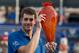 Jul 28, 2013; Atlanta, GA, USA; John Isner (USA) holds the winner's trophy after defeating Kevin Anderson (RSA) during the singles finals of the BB&T Atlanta Open at Atlantic Station. Isner won 6-7, 7-6, 7-6. Mandatory Credit: Joshua S. Kelly-USA TODAY Sp