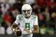 Aug 30, 2014; Eugene, OR, USA; Oregon Ducks quarterback Marcus Mariota (8) looks to make a throw against South Dakota Coyotes at Autzen Stadium. Mandatory Credit: Jaime Valdez-USA TODAY Sports