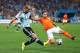 SAO PAULO, BRAZIL - JULY 09: Pablo Zabaleta of Argentina is challenged by Daley Blind of the Netherlands during the 2014 FIFA World Cup Brazil Semi Final match between the Netherlands and Argentina at Arena de Sao Paulo on July 9, 2014 in Sao Paulo, Brazi